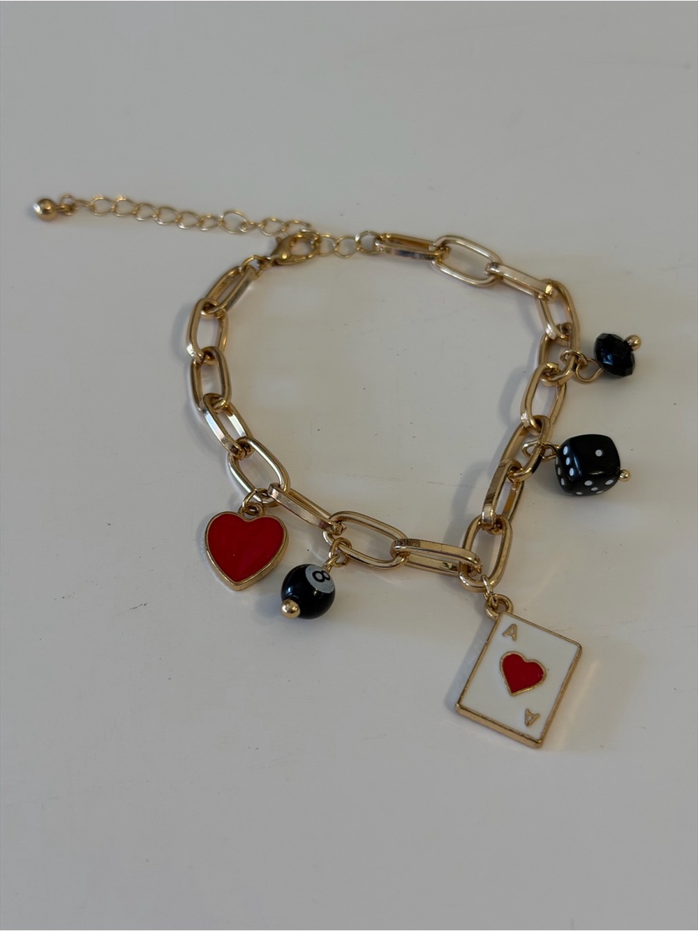 Gold-Tone Charm Bracelet with Red Heart & Black Dice Charms ace of hearts card